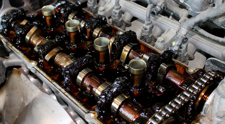 Масляные отложения в двигателе Масляные отложения в двигателе